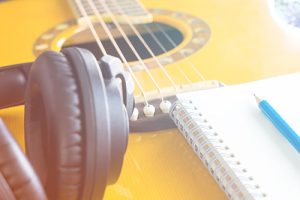 Guitar and Headphone notebook for songwriting