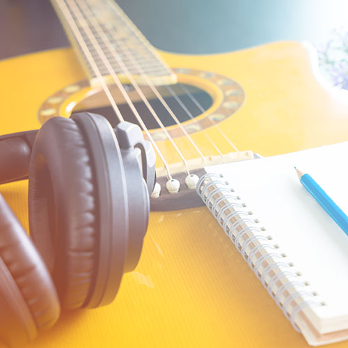 Guitar and Headphone notebook for songwriting